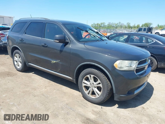 2011 Dodge Durango Crew with VIN 1D4RE4GG4BC599282, listed as a IAAI auction lot 42228048 with 150,514 mi miles and . Bid and sale history available at carsss.com. Image 1.