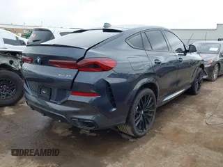 2022 BMW X6 xDrive40i z VIN 5UXCY6C08N9N30013, wystawiony jako IAAI lot #41772245 z przebiegiem 23 198 mil mil oraz . Historia ofert i sprzedaży dostępna na DreamBid. Obrazek 4.