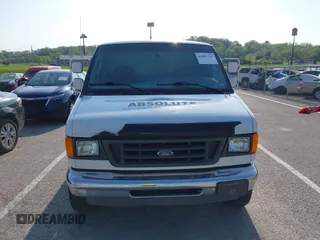 2004 Ford Econoline Cargo with VIN 1FTNE24L54HA37902, listed as a IAAI auction lot 42093747 with 250,773 mi miles. Bid and sale history available at carsss.com. Image 13.