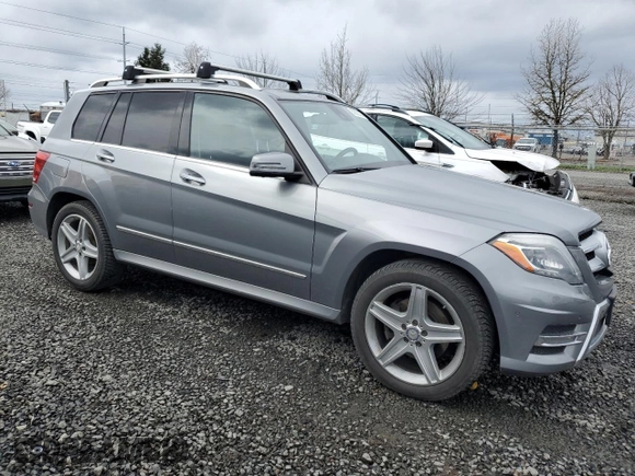 2014 Mercedes-Benz GLK 250 with VIN WDCGG0EB3EG195413, listed as a Copart auction lot 50622035 with 174,459 mi miles and Salvage Title. Bid and sale history available at DreamBid. Image 4.