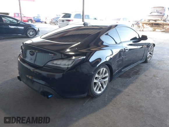 2014 Hyundai Genesis Coupe R-Spec z VIN KMHHT6KD0EU114041, wystawiony jako IAAI lot #41752761 z przebiegiem 107 377 mil mil oraz . Historia ofert i sprzedaży dostępna na DreamBid. Obrazek 4.