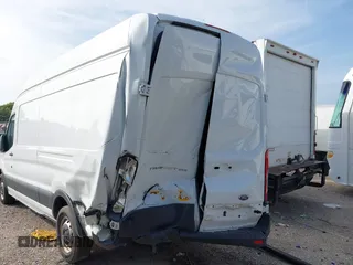 2016 Ford Transit Cargo z VIN 1FTYR3XM6GKB25327, wystawiony jako IAAI lot #42468273 z przebiegiem 137 976 mil mil oraz . Historia ofert i sprzedaży dostępna na DreamBid. Obrazek 3.