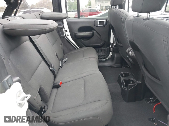 2021 Jeep Wrangler Unlimited Sport Altitude with VIN 1C4HJXDN5MW644613, listed as a IAAI auction lot 42466188 with 63,959 mi miles and . Bid and sale history available at DreamBid. Image 8.