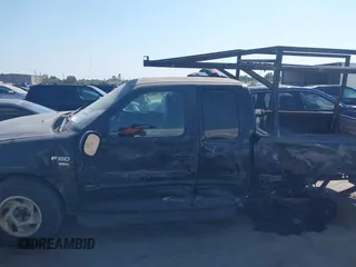 1999 Ford F-150 с VIN 1FTRX17W5XNA42082, выставлен на аукционе IAAI как лот 40599993 с пробегом Не указан миль и . История ставок и продаж доступна на DreamBid. Изображение 14.