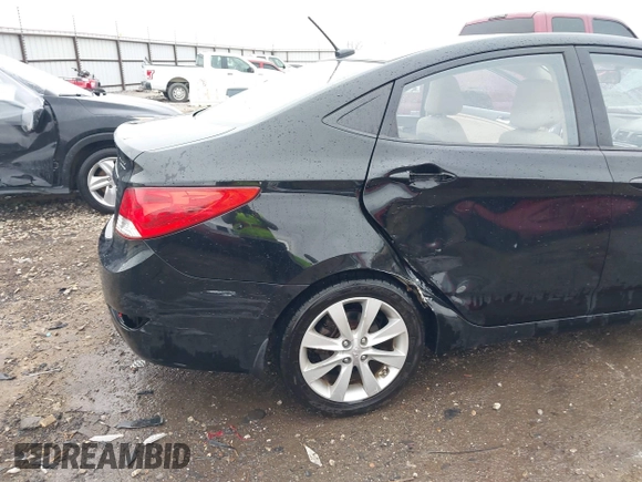 2013 Hyundai Accent GLS with VIN KMHCU4AE9DU379870, listed as a IAAI auction lot 41534029 with 102,610 mi miles. Bid and sale history available at carsss.com. Image 6.