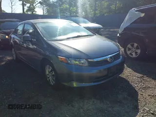 2012 Honda Civic LX z VIN 19XFB2F51CE384868, wystawiony jako IAAI lot #42414222 z przebiegiem 126 638 mil mil oraz . Historia ofert i sprzedaży dostępna na DreamBid. Obrazek 1.