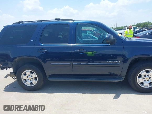 2007 Chevrolet Tahoe LT with VIN 1GNFC13017R374293, listed as a IAAI auction lot 42435427 with 75,212 mi miles and . Bid and sale history available at DreamBid. Image 14.