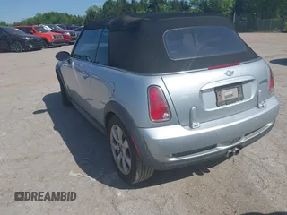 2006 MINI Convertible S with VIN WMWRH33596TK59633, listed as a IAAI auction lot 42242545 with 77,837 mi miles and . Bid and sale history available at DreamBid. Image 3.