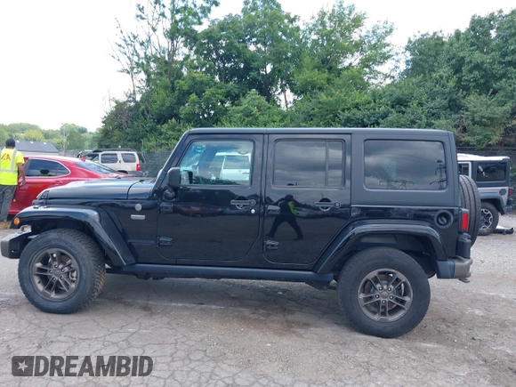 2016 Jeep Wrangler Unlimited Sahara z VIN 1C4HJWEG3GL343340, wystawiony jako IAAI lot #42683859 z przebiegiem 92 878 mil mil oraz . Historia ofert i sprzedaży dostępna na DreamBid. Obrazek 15.