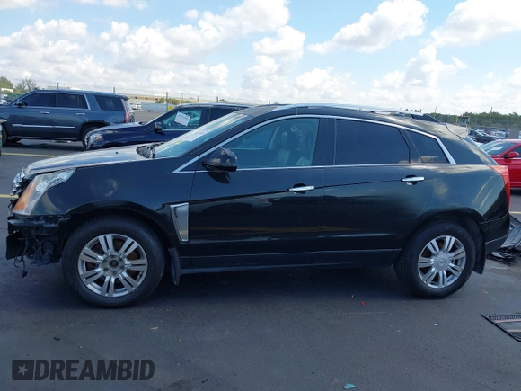 2013 Cadillac SRX Premium Collection with VIN 3GYFNEE34DS535613, listed as a IAAI auction lot 42336365 with 106,426 mi miles and . Bid and sale history available at DreamBid. Image 15.