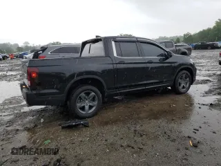 2023 Honda Ridgeline RTL with VIN 5FPYK3F51PB067811, listed as a Copart auction lot 56795995 with 21,500 mi miles and Salvage title. Bid and sale history available at DreamBid. Image 3.
