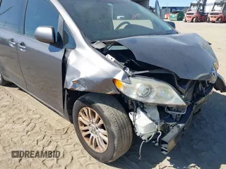 2012 Toyota Sienna XLE AAS with VIN 5TDYK3DC1CS186331, listed as a IAAI auction lot 41545031 with 240,788 mi miles and . Bid and sale history available at DreamBid. Image 6.