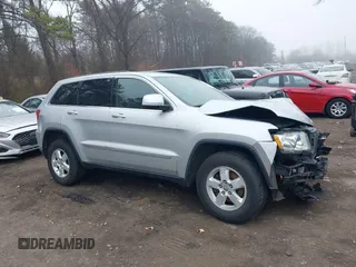 2013 Jeep Grand Cherokee Laredo with VIN 1C4RJFAGXDC537367, listed as a IAAI auction lot 41906921 with 124,679 mi miles. Bid and sale history available at carsss.com. Image 13.