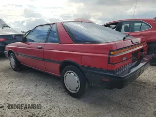 1987 Nissan Sentra z VIN JN1PB2411HU026525, wystawiony jako Copart lot #78997744 z przebiegiem 65 716 mil mil oraz Nie do naprawy. Historia ofert i sprzedaży dostępna na DreamBid. Obrazek 2.