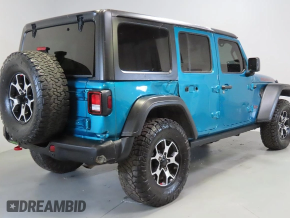 2020 Jeep Wrangler Unlimited Rubicon z VIN 1C4HJXFG0LW141133, wystawiony jako Copart lot #59150925 z przebiegiem 61 973 mil mil oraz Szkoda całkowita • Salvage title. Historia ofert i sprzedaży dostępna na DreamBid. Obrazek 3.