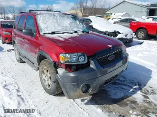 2005 Ford Escape XLT with VIN 1FMYU931X5KD99667, listed as a IAAI auction lot 41591057 with 69,595 mi miles. Bid and sale history available at carsss.com. Image 1.