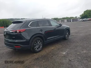 2020 Mazda CX-9 Touring with VIN JM3TCBCY5L0422262, listed as a IAAI auction lot 42456246 with 69,211 mi miles and . Bid and sale history available at DreamBid. Image 4.
