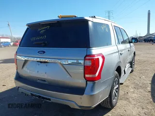 2020 Ford Expedition XLT with VIN 1FMJU1HT6LEA28613, listed as a IAAI auction lot 41822409 with 59,769 mi miles and . Bid and sale history available at DreamBid. Image 4.