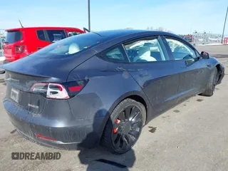 2021 Tesla Model 3 Performance with VIN 5YJ3E1EC3MF082532, listed as a IAAI auction lot 41757905 with 60,431 mi miles and . Bid and sale history available at DreamBid. Image 4.