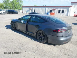 2022 Tesla Model S with VIN 5YJSA1E57NF479056, listed as a IAAI auction lot 42091009 with 78,272 mi miles and . Bid and sale history available at DreamBid. Image 3.