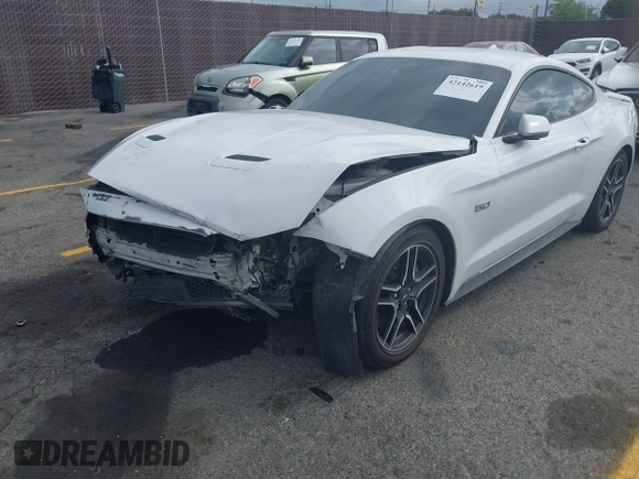 2021 Ford Mustang GT with VIN 1FA6P8CF5M5115597, listed as a IAAI auction lot 42142619 with 101,687 mi miles and . Bid and sale history available at DreamBid. Image 2.
