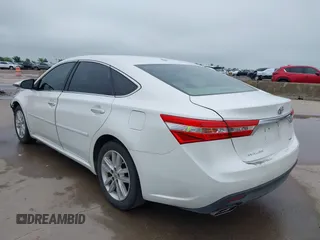 2014 Toyota Avalon Limited z VIN 4T1BK1EB6EU098479, wystawiony jako IAAI lot #42171736 z przebiegiem 92 290 mil mil oraz . Historia ofert i sprzedaży dostępna na DreamBid. Obrazek 3.