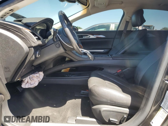 2013 Lincoln MKZ Hybrid with VIN 3LN6L2LU1DR808323, listed as a Copart auction lot 58077725 with 128,837 mi miles and Salvage title. Bid and sale history available at DreamBid. Image 7.