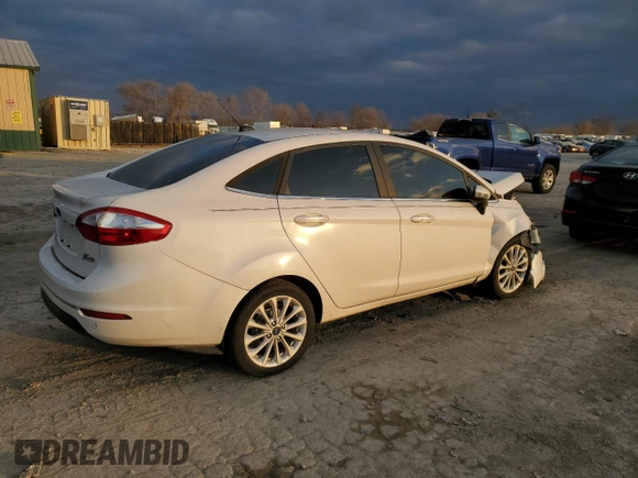 2017 Ford Fiesta Titanium with VIN 3FADP4CJ9HM136313, listed as a Copart auction lot 82610884 with Not Provided miles and Salvage Title. Bid and sale history available at DreamBid. Image 3.