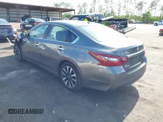 2018 Nissan Altima 2.5 SR with VIN 1N4AL3AP3JC127999, listed as a IAAI auction lot 42016201 with 120,628 mi miles. Bid and sale history available at carsss.com. Image 3.
