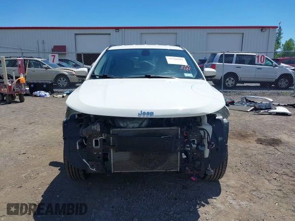 2020 Jeep Compass Latitude with VIN 3C4NJDBBXLT219466, listed as a IAAI auction lot 39766901 with 147,492 mi miles and . Bid and sale history available at DreamBid. Image 13.