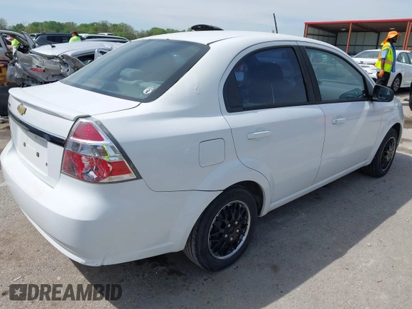 2011 Chevrolet Aveo 1LT with VIN KL1TD5DE7BB139819, listed as a IAAI auction lot 42090773 with 124,559 mi miles and . Bid and sale history available at DreamBid. Image 4.