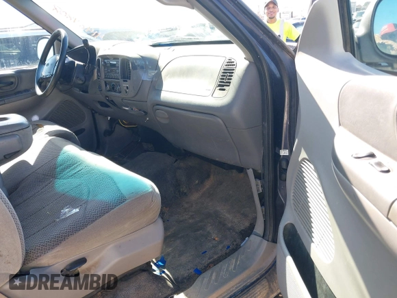 1999 Ford F-150 with VIN 1FTRX18W5XNA08724, listed as a IAAI auction lot 41484808 with Not provided miles and . Bid and sale history available at DreamBid. Image 5.