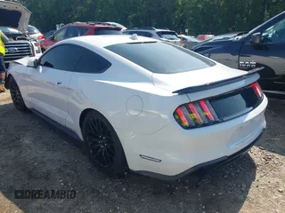 2021 Ford Mustang EcoBoost with VIN 1FA6P8TH6M5155737, listed as a IAAI auction lot 42389839 with 39,754 mi miles and . Bid and sale history available at DreamBid. Image 3.