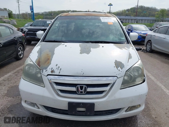 2007 Honda Odyssey Touring with VIN 5FNRL38887B081562, listed as a IAAI auction lot 42000435 with 238,287 mi miles and . Bid and sale history available at DreamBid. Image 13.