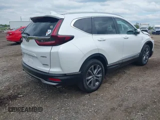 2021 Honda CR-V Touring with VIN 5J6RW2H93ML012016, listed as a IAAI auction lot 42365715 with 55,114 mi miles and . Bid and sale history available at DreamBid. Image 4.
