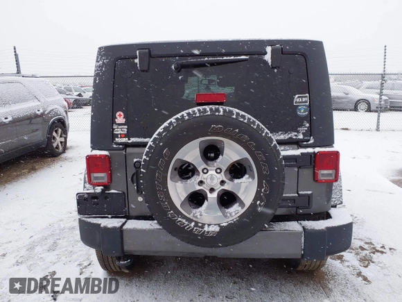 2017 Jeep Wrangler Unlimited Sahara with VIN 1C4BJWEG4HL591149, listed as a IAAI auction lot 41542157 with 70,630 mi miles. Bid and sale history available at carsss.com. Image 16.