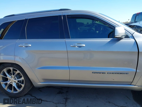 2020 Jeep Grand Cherokee Summit z VIN 1C4RJFJG2LC173184, wystawiony jako IAAI lot #41343182 z przebiegiem 70 192 mil mil oraz . Historia ofert i sprzedaży dostępna na DreamBid. Obrazek 13.