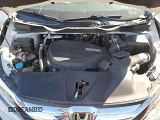 2020 Honda Odyssey Touring with VIN 5FNRL6H8XLB007622, listed as a Copart auction lot 76297494 with 83,452 mi miles and Salvage Title. Bid and sale history available at DreamBid. Image 13.