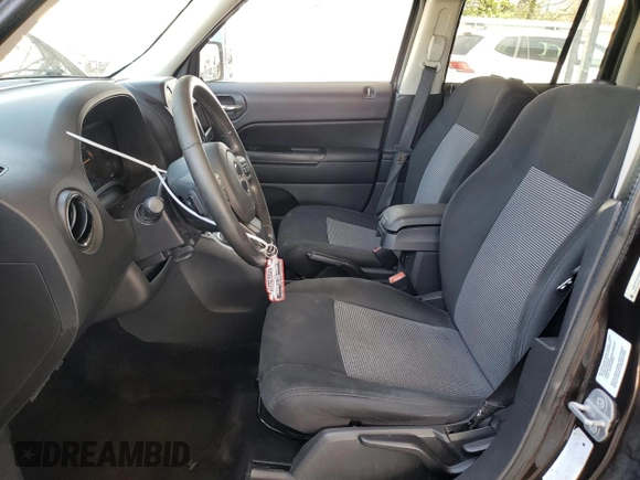 2014 Jeep Patriot High Altitude with VIN 1C4NJPFA2ED624667, listed as a Copart auction lot 52130375 with 198,806 mi miles and Salvage Title. Bid and sale history available at carsss.com. Image 7.