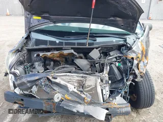 2014 Toyota Sienna L with VIN 5TDZK3DC4ES407928, listed as a IAAI auction lot 41887349 with 208,289 mi miles. Bid and sale history available at carsss.com. Image 10.