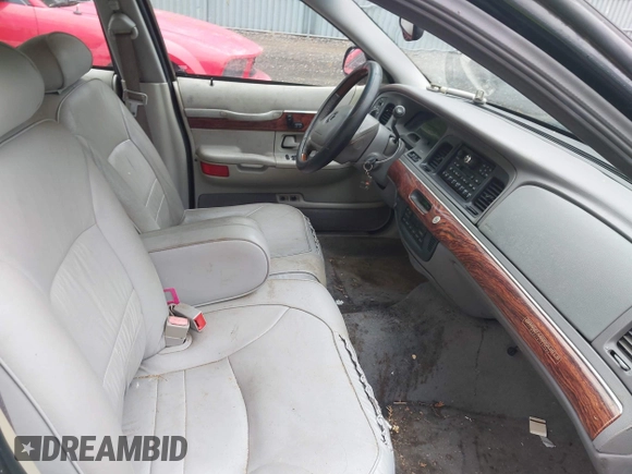 2002 Mercury Grand Marquis LS Premium z VIN 2MEFM75W42X644236, wystawiony jako IAAI lot #42276863 z przebiegiem 56 460 mil mil oraz . Historia ofert i sprzedaży dostępna na DreamBid. Obrazek 5.