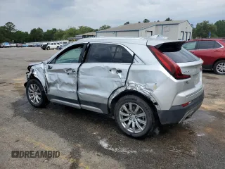 2020 Cadillac XT4 FWD Premium Luxury with VIN 1GYFZCR45LF027018, listed as a Copart auction lot 55537625 with 98,651 mi miles and Salvage title. Bid and sale history available at DreamBid. Image 2.