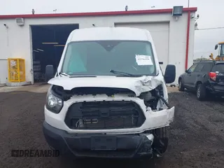 2019 Ford Transit with VIN 1FTYR2CM8KKA85504, listed as a IAAI auction lot 42236458 with Not Provided miles and . Bid and sale history available at DreamBid. Image 12.