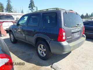 2006 Mazda Tribute i with VIN 4F2YZ02Z16KM00215, listed as a IAAI auction lot 42153919 with 272,828 mi miles and . Bid and sale history available at carsss.com. Image 3.