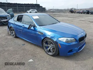 2013 BMW M5 with VIN WBSFV9C56DD096988, listed as a IAAI auction lot 41833177 with 84,337 mi miles. Bid and sale history available at carsss.com. Image 1.
