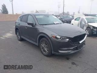 2017 Mazda CX-5 Touring with VIN JM3KFACL6H0161118, listed as a IAAI auction lot 41985719 with 50,309 mi miles. Bid and sale history available at carsss.com. Image 1.