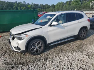 2019 BMW X1 sDrive28i z VIN WBXHU7C5XK3H46292, wystawiony jako Copart lot #59695305 z przebiegiem 63 544 mil mil oraz Szkoda całkowita • Salvage title. Historia ofert i sprzedaży dostępna na DreamBid. Obrazek 1.