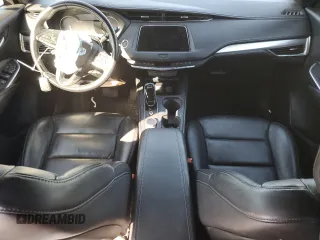 2021 Cadillac XT4 AWD Premium Luxury with VIN 1GYFZDR47MF002175, listed as a Copart auction lot 48303665 with 94,698 mi miles and Salvage Title. Bid and sale history available at carsss.com. Image 8.