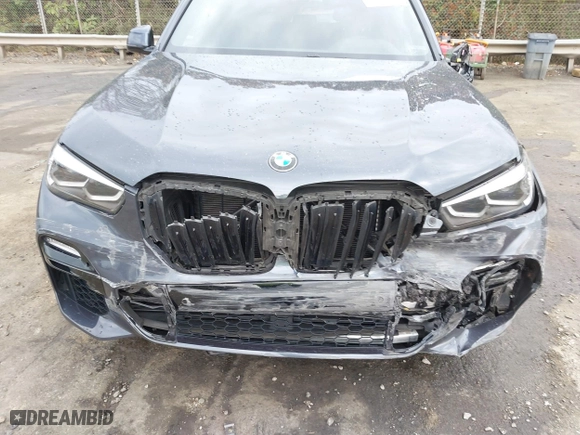 2021 BMW X5 xDrive40i with VIN 5UXCR6C01M9H56800, listed as a IAAI auction lot 41860035 with 51,779 mi miles. Bid and sale history available at carsss.com. Image 6.