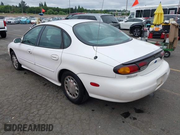 1997 Ford Taurus LX z VIN 1FALP53S0VG291879, wystawiony jako IAAI lot #42498197 z przebiegiem 266 886 mil mil oraz . Historia ofert i sprzedaży dostępna na DreamBid. Obrazek 3.